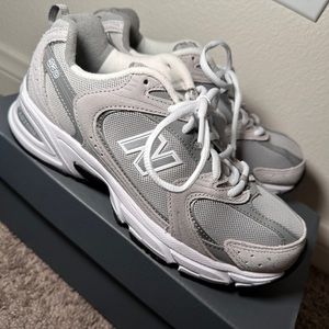 RE-LISTNever worn grey and white New Balance 530! 7 in women’s and 5.5 in men’s…